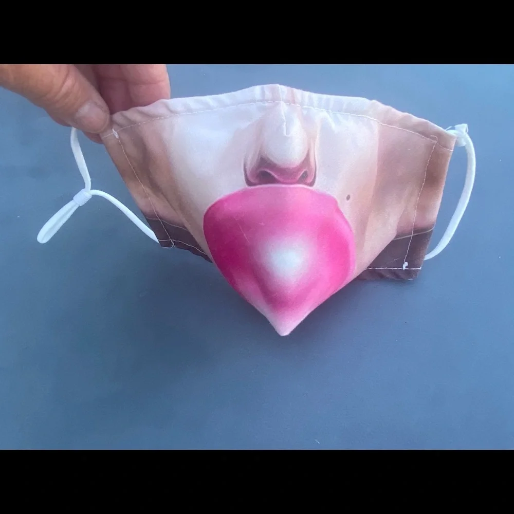 FUN mask! Has 2 NEW filters for inside pouch
